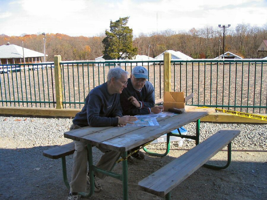 Event Director Ron Wood (L) and Bob Meyer review Fair Hill courses